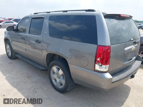 2007 Chevrolet Suburban LS with VIN 1GNFC160X7J233586, listed as a IAAI auction lot 42165186 with 240,183 mi miles and . Bid and sale history available at DreamBid. Image 3.