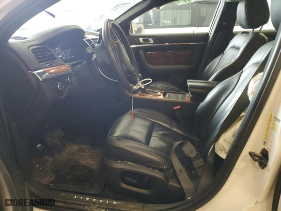 2014 Lincoln MKS with VIN 1LNHL9EK2EG605964, listed as a Copart auction lot 51810195 with 102,850 mi miles and Non Repairable. Bid and sale history available at carsss.com. Image 7.
