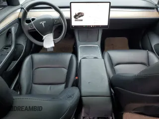 2023 Tesla Model 3 with VIN 5YJ3E1EA2PF457667, listed as a Copart auction lot 57360035 with 53,962 mi miles and Salvage title. Bid and sale history available at DreamBid. Image 8.