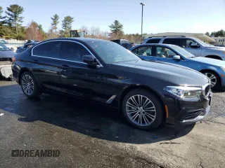 2019 BMW 5 Series 530i xDrive with VIN WBAJA7C54KWW23037, listed as a Copart auction lot 51291755 with 23,456 mi miles and Salvage Title. Bid and sale history available at DreamBid. Image 4.
