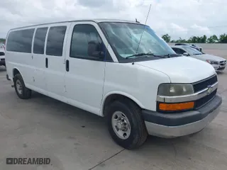2012 Chevrolet Express Passenger 1LT with VIN 1GAZG1FG9C1129455, listed as a IAAI auction lot 42105765 with 150,090 mi miles. Bid and sale history available at carsss.com. Image 1.