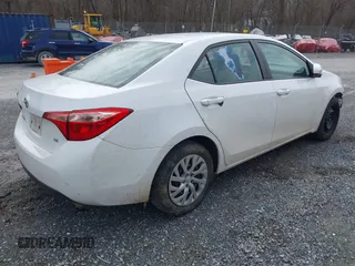 2018 Toyota Corolla L z VIN 5YFBURHE7JP840916, wystawiony jako IAAI lot #41603264 z przebiegiem 218 028 mil mil oraz . Historia ofert i sprzedaży dostępna na DreamBid. Obrazek 4.