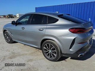 2025 BMW X6 xDrive40i z VIN 5UX33EX02S9W99295, wystawiony jako Copart lot #56997185 z przebiegiem 31 308 mil mil oraz Tytuł czysty. Historia ofert i sprzedaży dostępna na DreamBid. Obrazek 2.