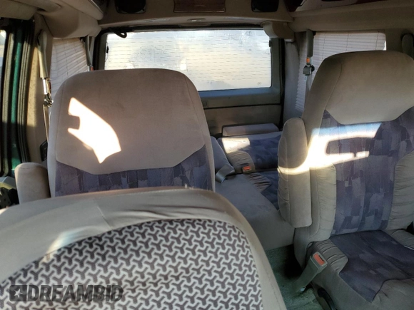 1998 GMC Safari z VIN 1GDDM19W5WB503552, wystawiony jako Copart lot #88247495 z przebiegiem 267 494 mil mil oraz Szkoda całkowita • Salvage title. Historia ofert i sprzedaży dostępna na DreamBid. Obrazek 10.