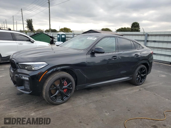 2021 BMW X6 xDrive40i with VIN 5UXCY6C00M9E08487, listed as a Copart auction lot 46477895 with 34,000 mi miles and Salvage Title. Bid and sale history available at carsss.com. Image 1.