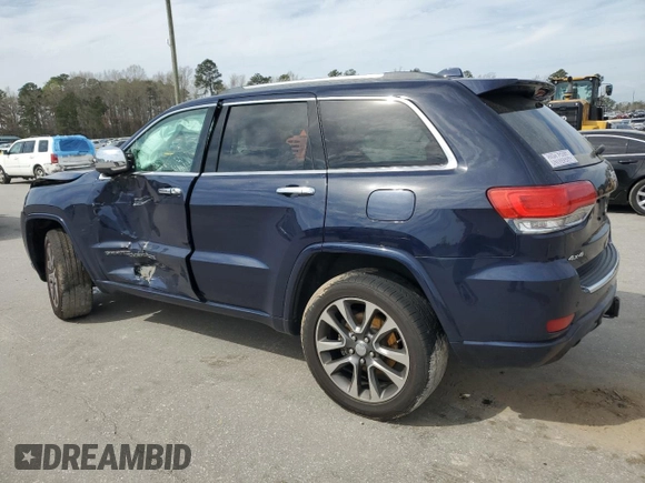 2017 Jeep Grand Cherokee Overland with VIN 1C4RJFCG6HC602413, listed as a Copart auction lot 49641325 with 157,558 mi miles and Salvage Title. Bid and sale history available at carsss.com. Image 2.