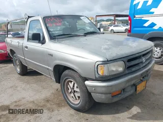 1994 Mazda B-Series Truck z VIN 4F4CR12A3RTM46760, wystawiony jako IAAI lot #41916078 z przebiegiem 276 129 mil mil oraz . Historia ofert i sprzedaży dostępna na DreamBid. Obrazek 1.