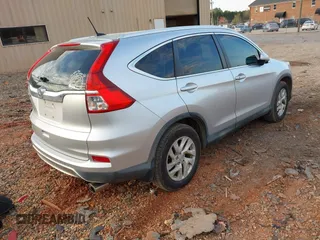 2015 Honda CR-V EX-L with VIN 2HKRM3H77FH524093, listed as a IAAI auction lot 41912203 with 157,328 mi miles. Bid and sale history available at carsss.com. Image 4.