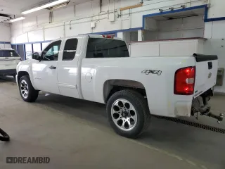 2011 Chevrolet Silverado 1500 LT with VIN 1GCRKSE32BZ393353, listed as a Copart auction lot 52438415 with 242,829 mi miles and Salvage Title. Bid and sale history available at carsss.com. Image 2.