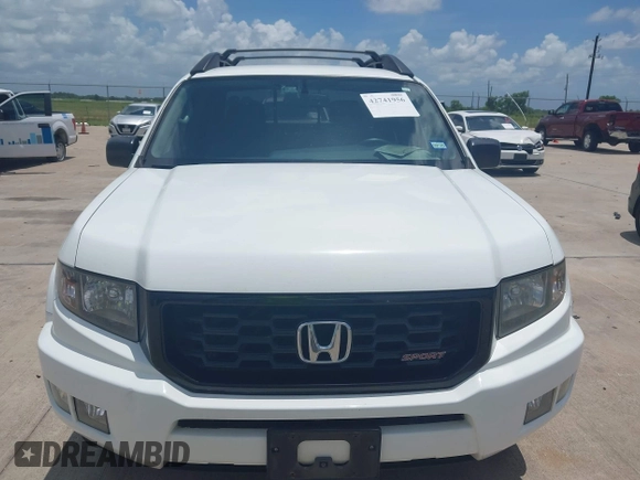 2014 Honda Ridgeline Sport with VIN 5FPYK1F71EB011340, listed as a IAAI auction lot 42741956 with 156,149 mi miles and . Bid and sale history available at DreamBid. Image 12.