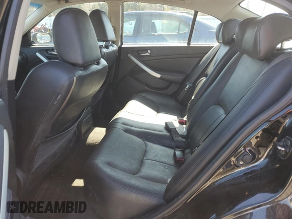 2006 Infiniti G35 z VIN JNKCV51FX6M617002, wystawiony jako Copart lot #51064345 z przebiegiem Nie podano mil oraz Szkody całkowita. Historia ofert i sprzedaży dostępna na DreamBid. Obrazek 10.