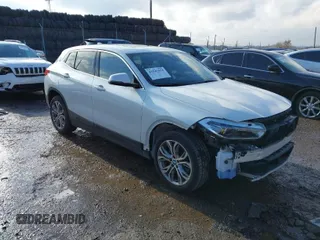 2020 BMW X2 xDrive28i with VIN WBXYJ1C00L5R70720, listed as a IAAI auction lot 41541553 with 17,127 mi miles. Bid and sale history available at carsss.com. Image 1.