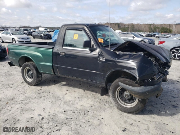 2000 Mazda B-Series 2WD Truck SX with VIN 4F4YR12V6YTM25960, listed as a Copart auction lot 43944095 with 140,980 mi miles and Salvage Title. Bid and sale history available at carsss.com. Image 4.