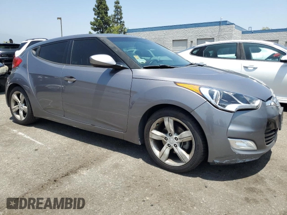 2014 Hyundai Veloster z VIN KMHTC6AD9EU200511, wystawiony jako Copart lot #59934645 z przebiegiem 176 436 mil mil oraz Czysty tytuł • Clean title. Historia ofert i sprzedaży dostępna na DreamBid. Obrazek 4.