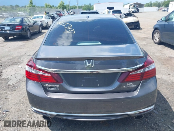2017 Honda Accord Touring with VIN 1HGCR3F98HA015928, listed as a IAAI auction lot 42553437 with 168,902 mi miles and . Bid and sale history available at DreamBid. Image 16.