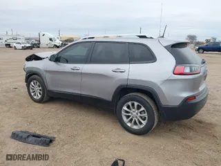 2020 Jeep Cherokee Latitude with VIN 1C4PJLCB9LD552992, listed as a IAAI auction lot 41290941 with 56,081 mi miles. Bid and sale history available at carsss.com. Image 3.