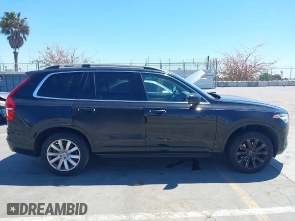 2016 Volvo XC90 T6 Momentum with VIN YV4A22PK1G1074286, listed as a IAAI auction lot 42202492 with 104,791 mi miles and . Bid and sale history available at DreamBid. Image 13.