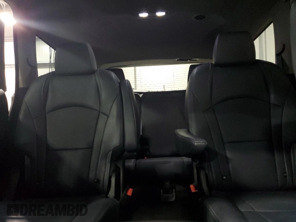 2019 Buick Enclave Essence with VIN 5GAEVAKW6KJ161465, listed as a Copart auction lot 54050365 with 143,698 mi miles and Salvage Title. Bid and sale history available at DreamBid. Image 10.