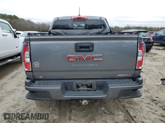 2022 GMC Canyon 4WD AT4 z VIN 1GTG6FENXN1274389, wystawiony jako Copart lot #85255404 z przebiegiem 42 843 mil mil oraz Szkoda całkowita • Salvage title. Historia ofert i sprzedaży dostępna na DreamBid. Obrazek 6.