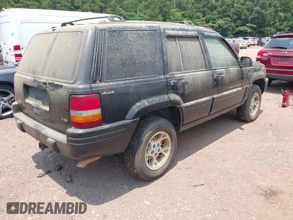 1996 Jeep Grand Cherokee Limited with VIN 1J4GZ78Y9TC351364, listed as a IAAI auction lot 42368001 with 254,634 mi miles and . Bid and sale history available at DreamBid. Image 4.