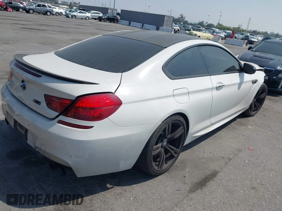 2013 BMW M6 z VIN WBSLX9C52DD159906, wystawiony jako IAAI lot #42095042 z przebiegiem 105 463 mil mil oraz . Historia ofert i sprzedaży dostępna na DreamBid. Obrazek 4.