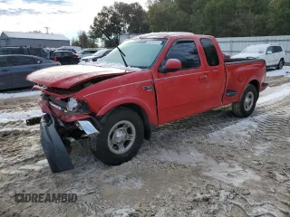2001 Ford F-150 XL with VIN 1FTRX07W31KE64015, listed as a Copart auction lot 89297905 with 198,881 mi miles and Salvage Title. Bid and sale history available at carsss.com. Image 1.