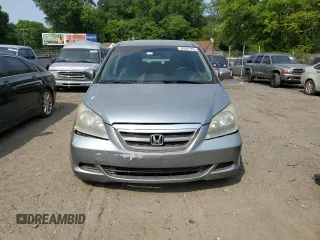 2006 Honda Odyssey EX z VIN 5FNRL38416B122268, wystawiony jako Copart lot #58969785 z przebiegiem 167 991 mil mil oraz Szkoda całkowita • Salvage title. Historia ofert i sprzedaży dostępna na DreamBid. Obrazek 5.