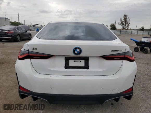 2023 BMW i4 eDrive40 with VIN WBY73AW0XPFN60228, listed as a Copart auction lot 61875624 with 21,597 mi miles and Salvage Title. Bid and sale history available at carsss.com. Image 6.