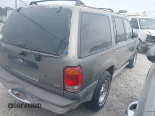2001 Ford Explorer XLT z VIN 1FMZU73E31ZA54199, wystawiony jako IAAI lot #41436931 z przebiegiem 212 087 mil mil oraz . Historia ofert i sprzedaży dostępna na DreamBid. Obrazek 4.