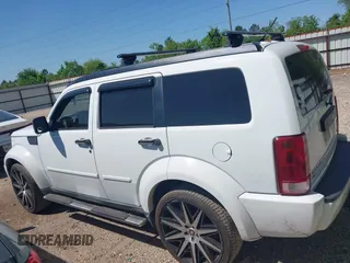 2011 Dodge Nitro Heat with VIN 1D4PT4GX9BW587284, listed as a IAAI auction lot 41998357 with 100,366 mi miles and . Bid and sale history available at DreamBid. Image 14.