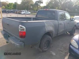 2004 Toyota Tundra SR5 with VIN 5TBET34114S436871, listed as a IAAI auction lot 41735558 with 240,899 mi miles. Bid and sale history available at carsss.com. Image 4.