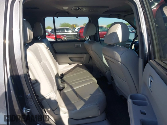 2014 Honda Pilot Touring z VIN 5FNYF4H90EB033259, wystawiony jako IAAI lot #42287774 z przebiegiem 115 416 mil mil oraz . Historia ofert i sprzedaży dostępna na DreamBid. Obrazek 8.
