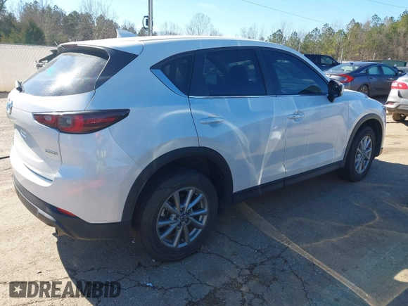 2023 Mazda CX-5 2.5 S Preferred Package with VIN JM3KFBCM6P0140427, listed as a IAAI auction lot 41335811 with 42,713 mi miles. Bid and sale history available at carsss.com. Image 4.