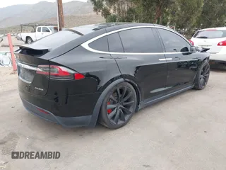 2020 Tesla Model X P90D with VIN 5YJXCDE4XLF296255, listed as a IAAI auction lot 42087953 with 45,411 mi miles. Bid and sale history available at carsss.com. Image 4.