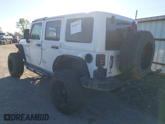 2016 Jeep Wrangler Unlimited Sahara with VIN 1C4BJWEG5GL243004, listed as a IAAI auction lot 40438321 with 121,360 mi miles and . Bid and sale history available at DreamBid. Image 3.