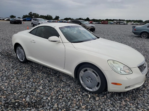 2003 Lexus SC 430 with VIN JTHFN48Y030045309, listed as a Copart auction lot 59034585 with 104,167 mi miles and Salvage title. Bid and sale history available at DreamBid. Image 4.