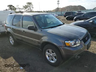 2006 Ford Escape Hybrid with VIN 1FMCU96H36KC35956, listed as a Copart auction lot 55588074 with 138,680 mi miles and Non Repairable. Bid and sale history available at carsss.com. Image 4.