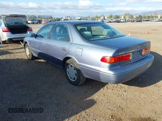 2000 Toyota Camry CE with VIN 4T1BG22K6YU000857, listed as a IAAI auction lot 42118645 with 244,448 mi miles and . Bid and sale history available at carsss.com. Image 3.