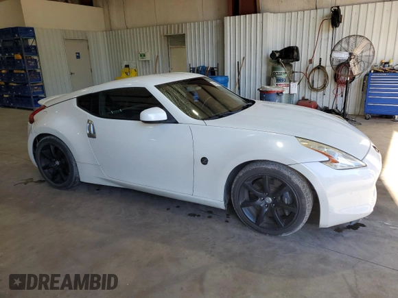 2010 Nissan 370Z Touring with VIN JN1AZ4EH8AM505975, listed as a Copart auction lot 80635634 with 107,404 mi miles and Salvage Title. Bid and sale history available at carsss.com. Image 4.