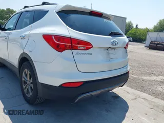 2014 Hyundai Santa Fe with VIN 5XYZUDLB9EG156555, listed as a IAAI auction lot 42721070 with 349,412 mi miles and . Bid and sale history available at DreamBid. Image 6.