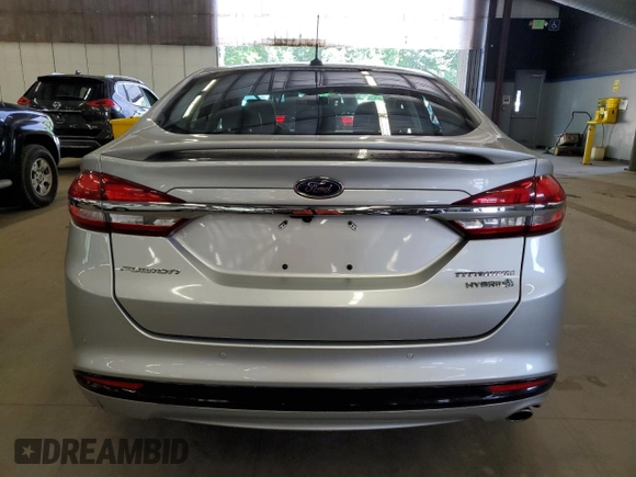 2017 Ford Fusion Hybrid Titanium z VIN 3FA6P0RU1HR300370, wystawiony jako Copart lot #65206605 z przebiegiem 150 424 mil mil oraz Czysty tytuł • Clean title. Historia ofert i sprzedaży dostępna na DreamBid. Obrazek 6.