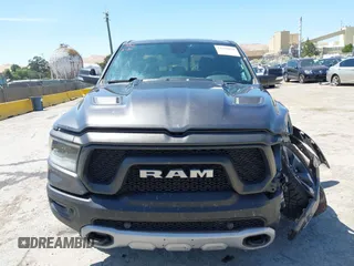 2020 Ram 1500 Rebel with VIN 1C6SRFLT8LN164196, listed as a IAAI auction lot 42538059 with 60,520 mi miles and . Bid and sale history available at DreamBid. Image 13.