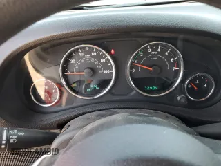 2012 Jeep Wrangler Sport z VIN 1C4AJWAG6CL216888, wystawiony jako Copart lot #65686715 z przebiegiem 72 404 mil mil oraz Czysty tytuł • Clean title. Historia ofert i sprzedaży dostępna na DreamBid. Obrazek 9.