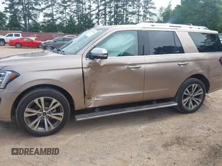 2020 Ford Expedition Platinum with VIN 1FMJU1MT6LEA51900, listed as a IAAI auction lot 42265591 with 70,022 mi miles and . Bid and sale history available at DreamBid. Image 14.
