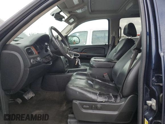 2007 GMC Yukon SLT with VIN 1GKFK13097J384794, listed as a Copart auction lot 72596384 with 198,381 mi miles and Salvage Title. Bid and sale history available at carsss.com. Image 7.