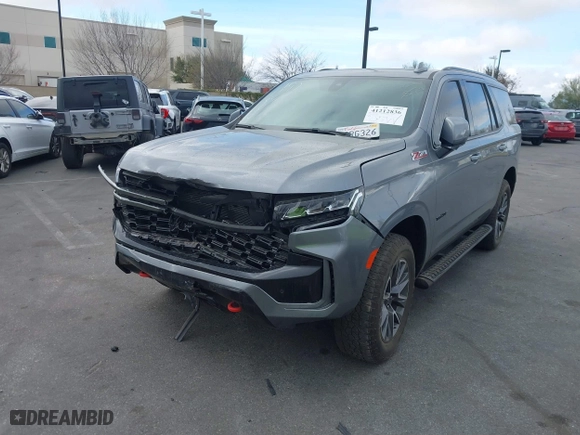 2022 Chevrolet Tahoe Z71 with VIN 1GNSKPKD3NR265727, listed as a IAAI auction lot 41212836 with 15,435 mi miles. Bid and sale history available at carsss.com. Image 2.