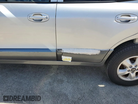 2005 Hyundai Santa Fe GLS with VIN KM8SC13E25U002566, listed as a Copart auction lot 73711124 with 152,245 mi miles and Salvage Title. Bid and sale history available at carsss.com. Image 13.