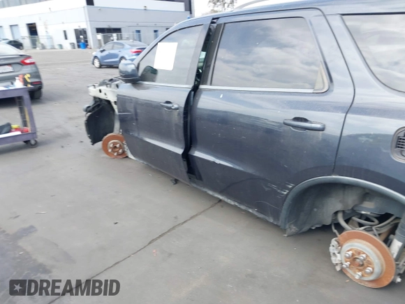 2015 Dodge Durango SXT with VIN 1C4RDHAG4FC113821, listed as a IAAI auction lot 42338999 with Not provided miles and . Bid and sale history available at DreamBid. Image 14.