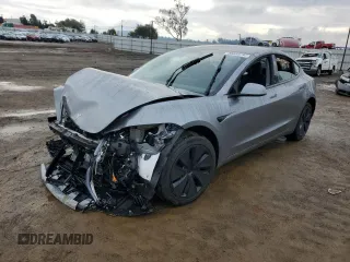 2025 Tesla Model 3 Long Range с VIN 5YJ3E1EA1SF888798, выставлен на аукционе Copart как лот 85558784 с пробегом 1 276 миль миль и Списание • Salvage title. История ставок и продаж доступна на DreamBid. Изображение 1.
