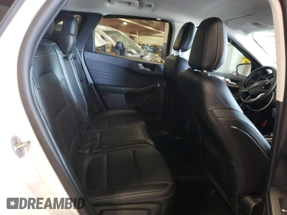 2021 Ford Escape SEL z VIN 1FMCU9H61MUA87268, wystawiony jako Copart lot #60645795 z przebiegiem 47 219 mil mil oraz Szkoda całkowita • Salvage title. Historia ofert i sprzedaży dostępna na DreamBid. Obrazek 11.
